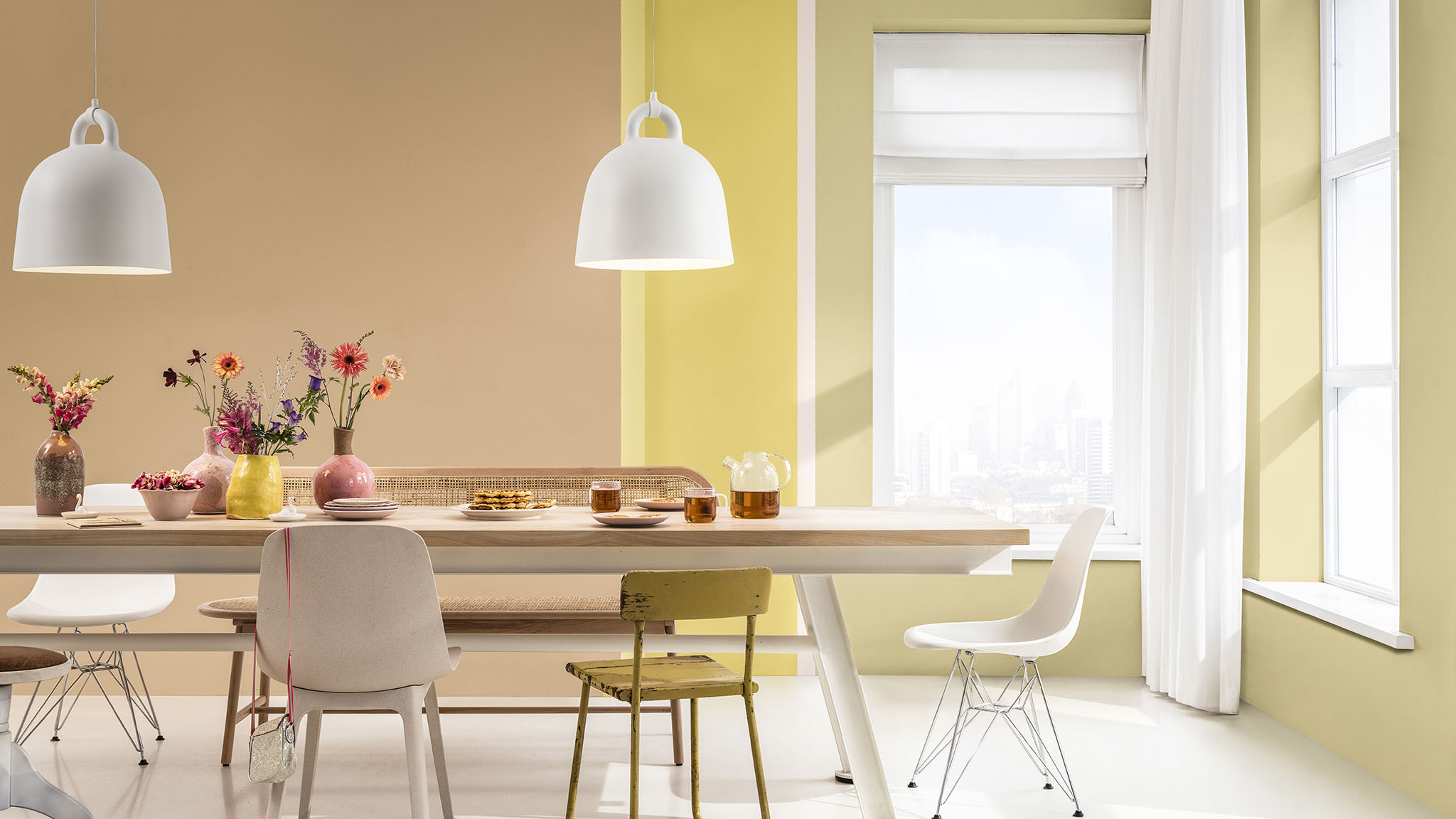 Dining area with peach, yellow and straw-colored walls