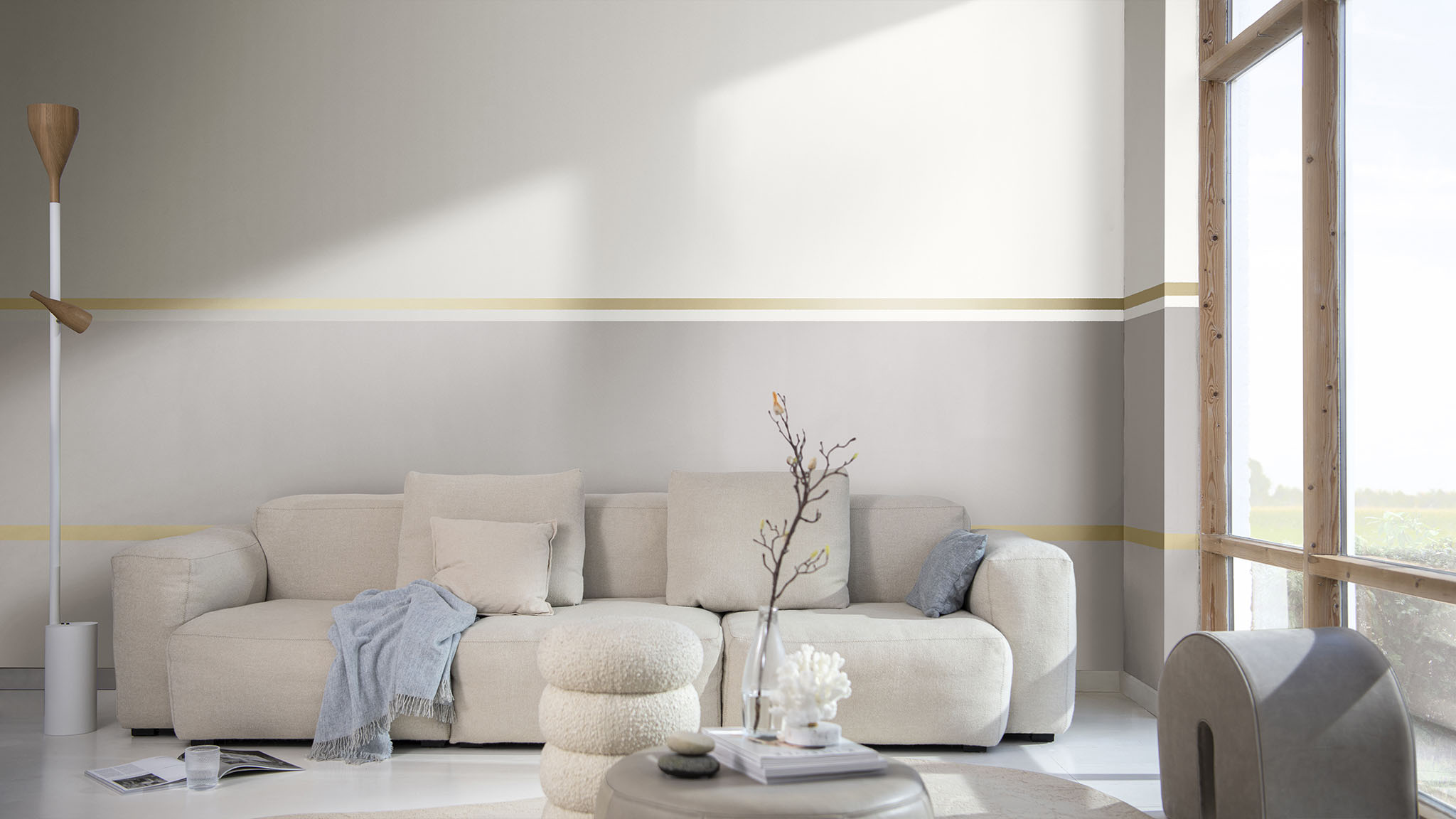 A split wall effect with a dividing line in a living room; large window on the right